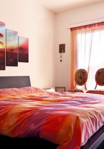 ARTGEIST Wild savannah - Den afrikanske savanne i rdt skr trykt p lrred - Flere strrelser