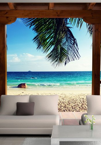 ARTGEIST Fototapet med motiv af feriehus med terrasse ved strand med palmer (flere strrelser)