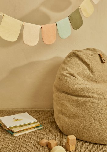 KAVE HOME Vicka puf i beige bouclé, 70 cm