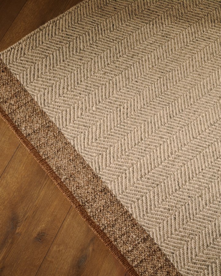 KAVE HOME Nifelia jacquardtppe i beige uld, 160 x 230 cm
