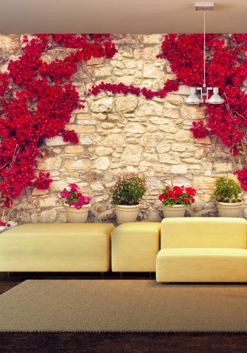 ARTGEIST fototapet - Warm afternoon, r murstensvg med smukke, rde blomster (flere strrelser)